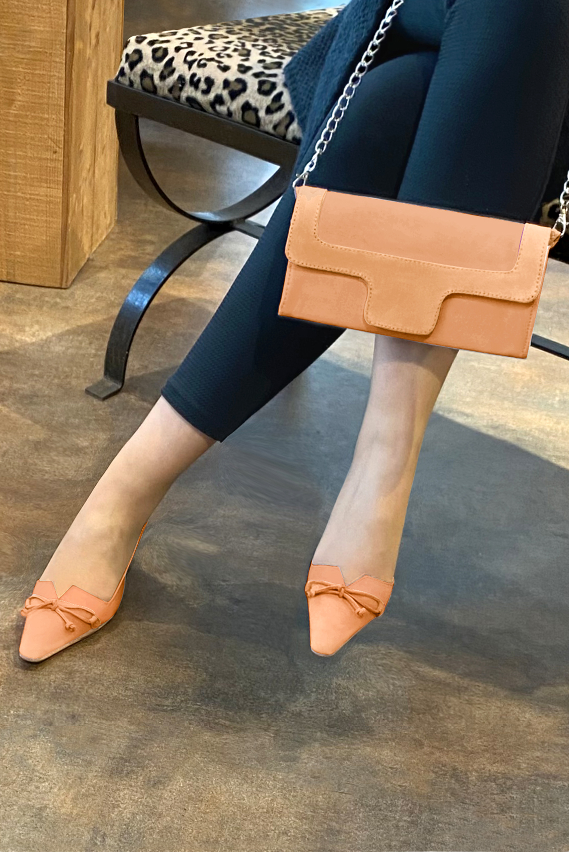 Marigold orange women's open back shoes, with a knot. Tapered toe. Low kitten heels. Worn view - Florence KOOIJMAN